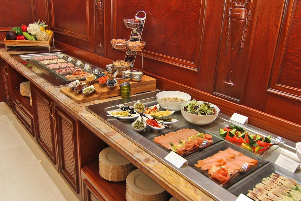Orion Hotel Bishkek Exterior foto A buffet